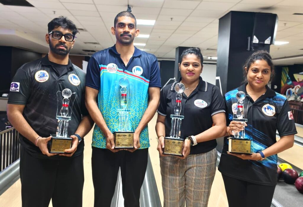 Winners and runners-up in the men’s and women’s divisions receive their trophies at Game Xtreme in Hyderabad on Monday.