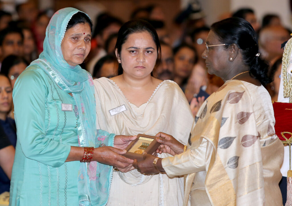 President Droupadi Murmu presents Shaurya Chakra (posthumous) to L/DFR Baldev Chand during Defence Investiture Ceremony 2026 (Phase-1), in New Delhi on Monday. The award is being received by his wife Shivani Ranot and mother Vijay Kumari.