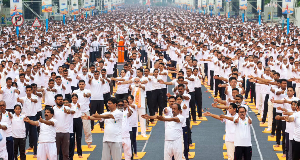 Prime Minister Narendra Modi performs Yoga along with thousands of participants during the national celebration of the 12th International Day of Yoga at Kolkata's historic Red Road on Sunday, June 21, 2026. Photos by PIB