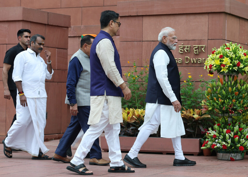 Prime Minister Narendra Modi, accompanied by Union Ministers, arrives at Parliament House ahead of the commencement of the Monsoon Session of Parliament in New Delhi on Monday.
